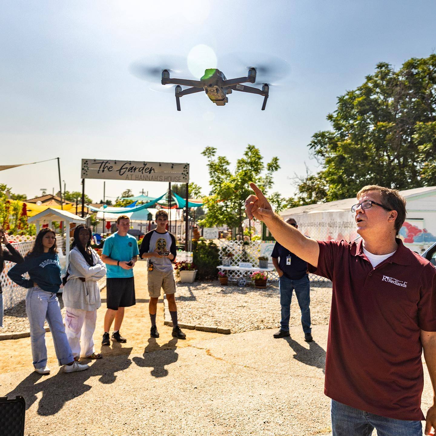 Club members watching a drone demonstration
